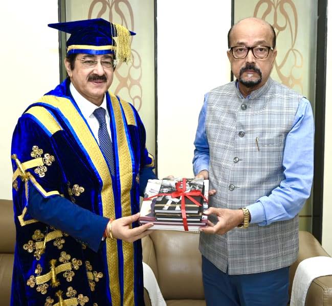 Dr. Sandeep Marwah Presents His Biographies to H.E. Ramen Deka, Governor of Chhattisgarh